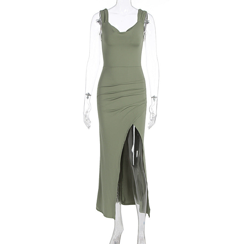 Sleeveless backless dress with adjustable ties and a fitted, slit design