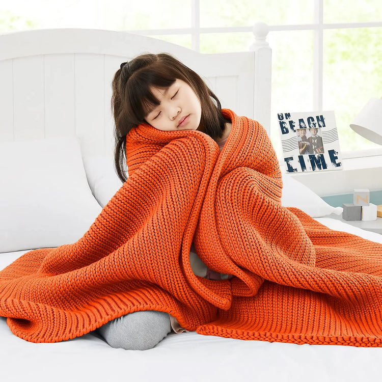 Orange Guohaoi knitted weighted blanket, 50x60 inches, 7 lbs, handmade chunky knit for hot sleepers, suitable for twin beds.