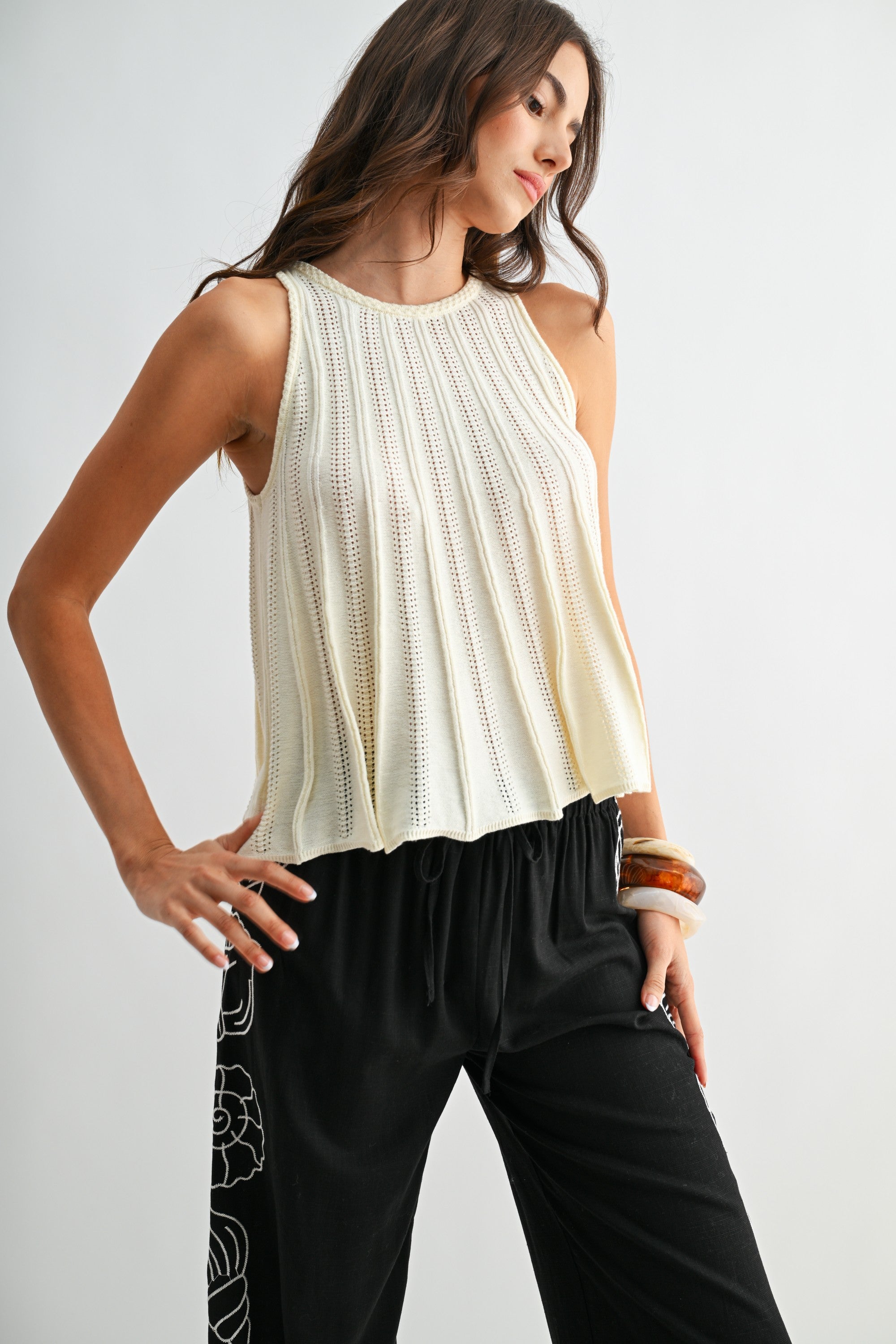 Sleeveless Knit Top With Flared Hem