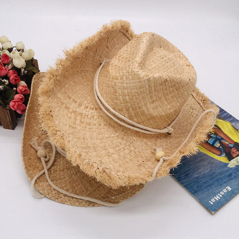 Modischer Fransensaum-Cowboyhut mit breiter Krempe Raffia-Stroh-Flanellhut Sonnenfester Strohhut für das Meer in Unifarben