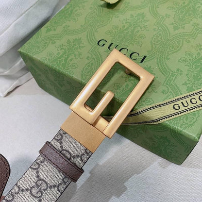 GUCCI Embellished coated-canvas and leather belt &