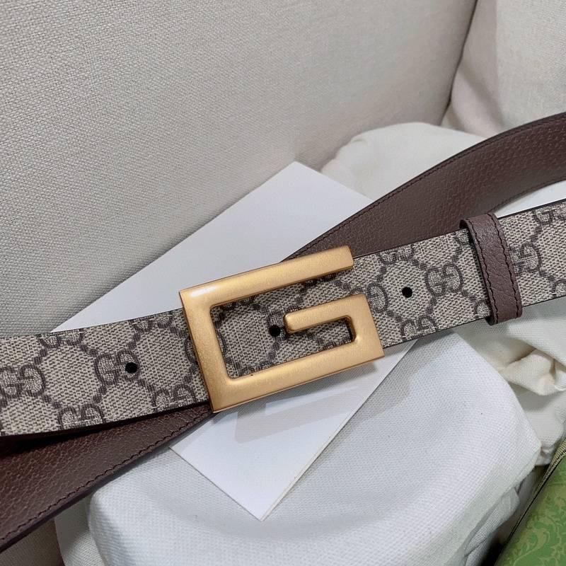 GUCCI Embellished coated-canvas and leather belt &