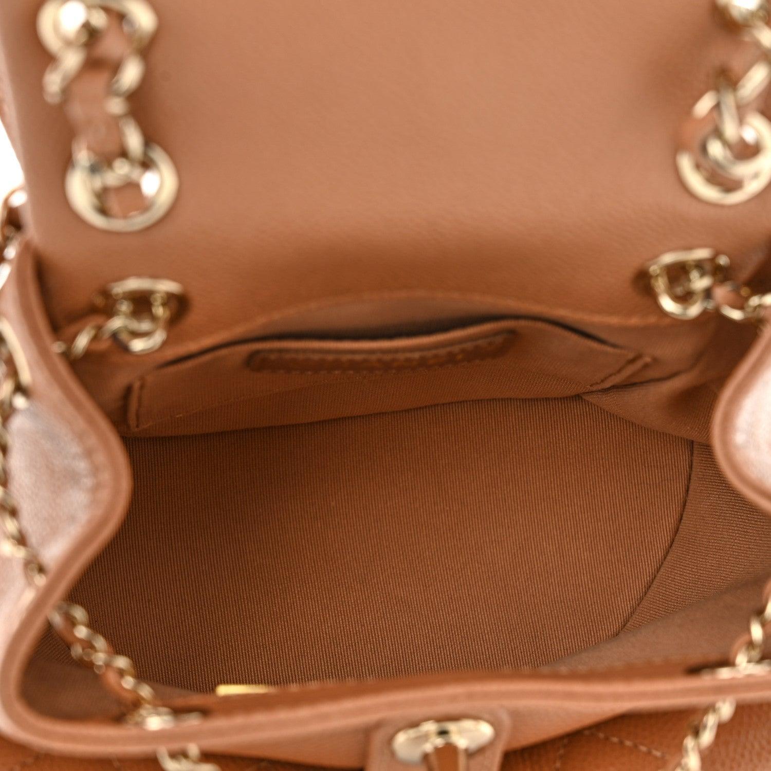 Chanel Shiny Caviar Quilted Small Duma Pockets Drawstring Backpack