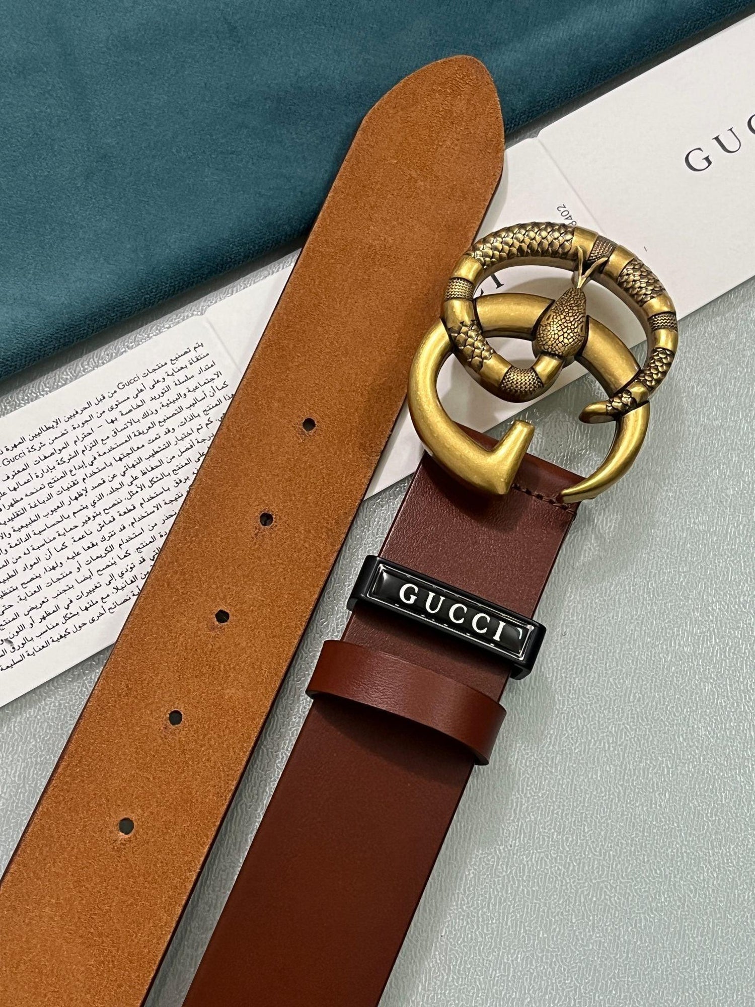 GUCCI Embellished coated-canvas and leather belt &