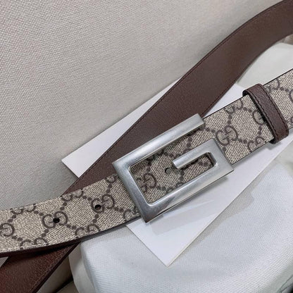 GUCCI Embellished coated-canvas and leather belt &