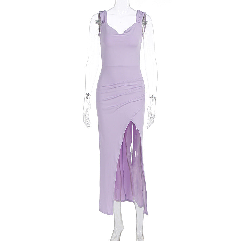 Sleeveless backless dress with adjustable ties and a fitted, slit design