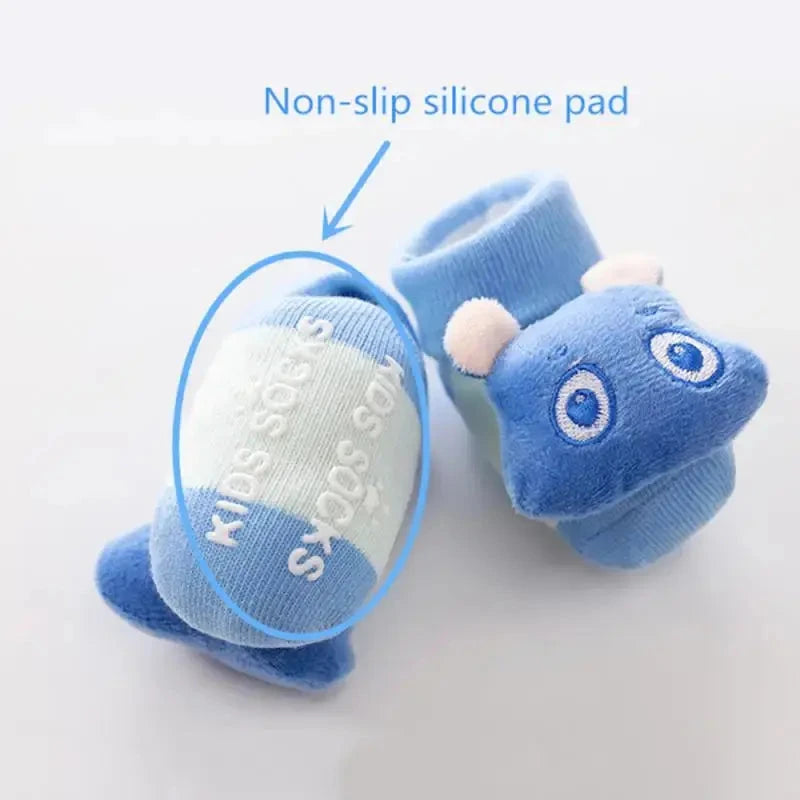 Cute cartoon baby anti-slip socks for infants, featuring rattle design and warm cotton material, ideal for first steps and autumn.