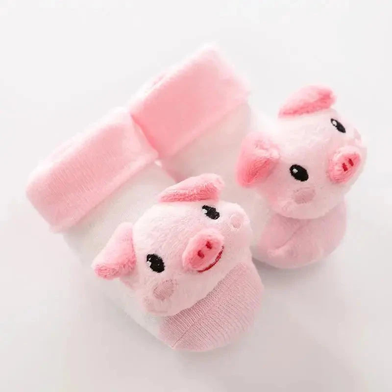 Cute cartoon baby anti-slip socks with rattles, warm cotton booties for newborns, suitable for boys and girls, perfect for first steps.
