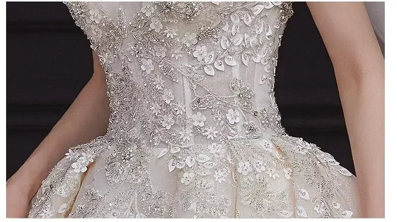 Luxury Off-Shoulder Wedding Dress - Handmade Lace Ball Gown | Femstylo