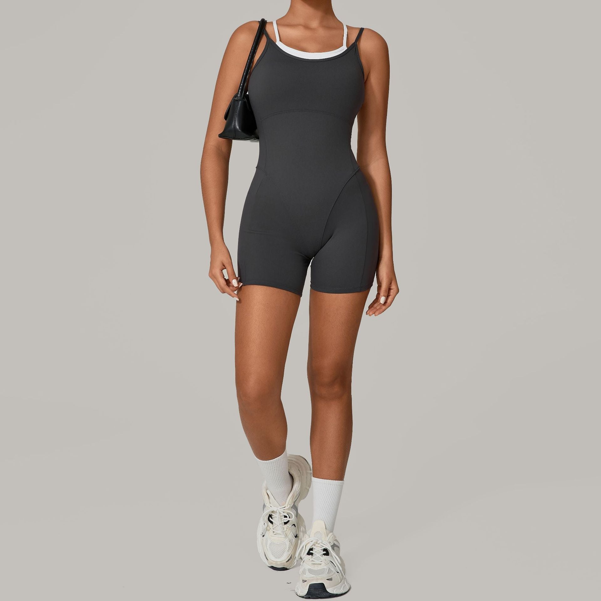 Herbst Sandfarben Falscher Zweiteiler Kontrastfarbener Sling-Sport-Jumpsuit Einteilige Yoga-Kleidung Rückenfrei Outdoor-Fitness Einteiler