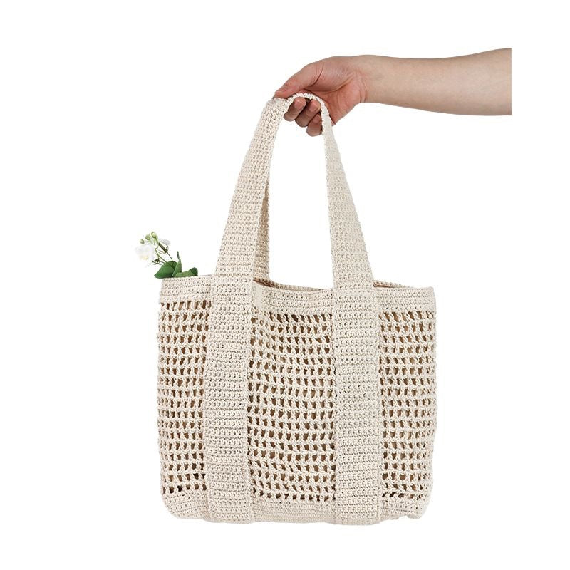Lässige Korbtasche mit großem Fassungsvermögen aus Baumwollfaden, ausgehöhlte Strandtasche für den Urlaub am Meer, Netz-Umhängetasche