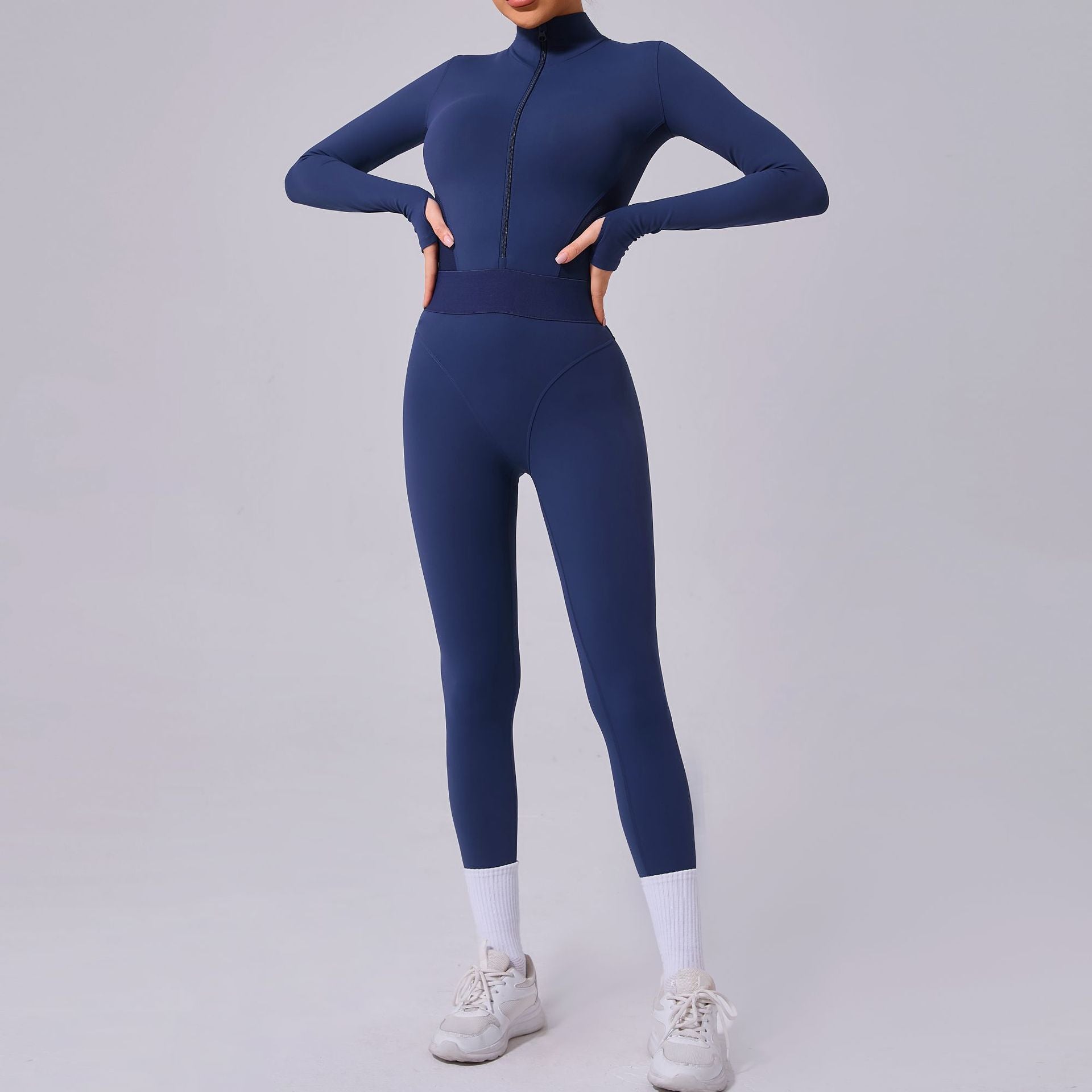 Mesh-Nähte an beiden Seiten Yoga-Jumpsuit Eng anliegender elastischer Bund Fingerloch-Naht Sport-Fitness-Einteiler