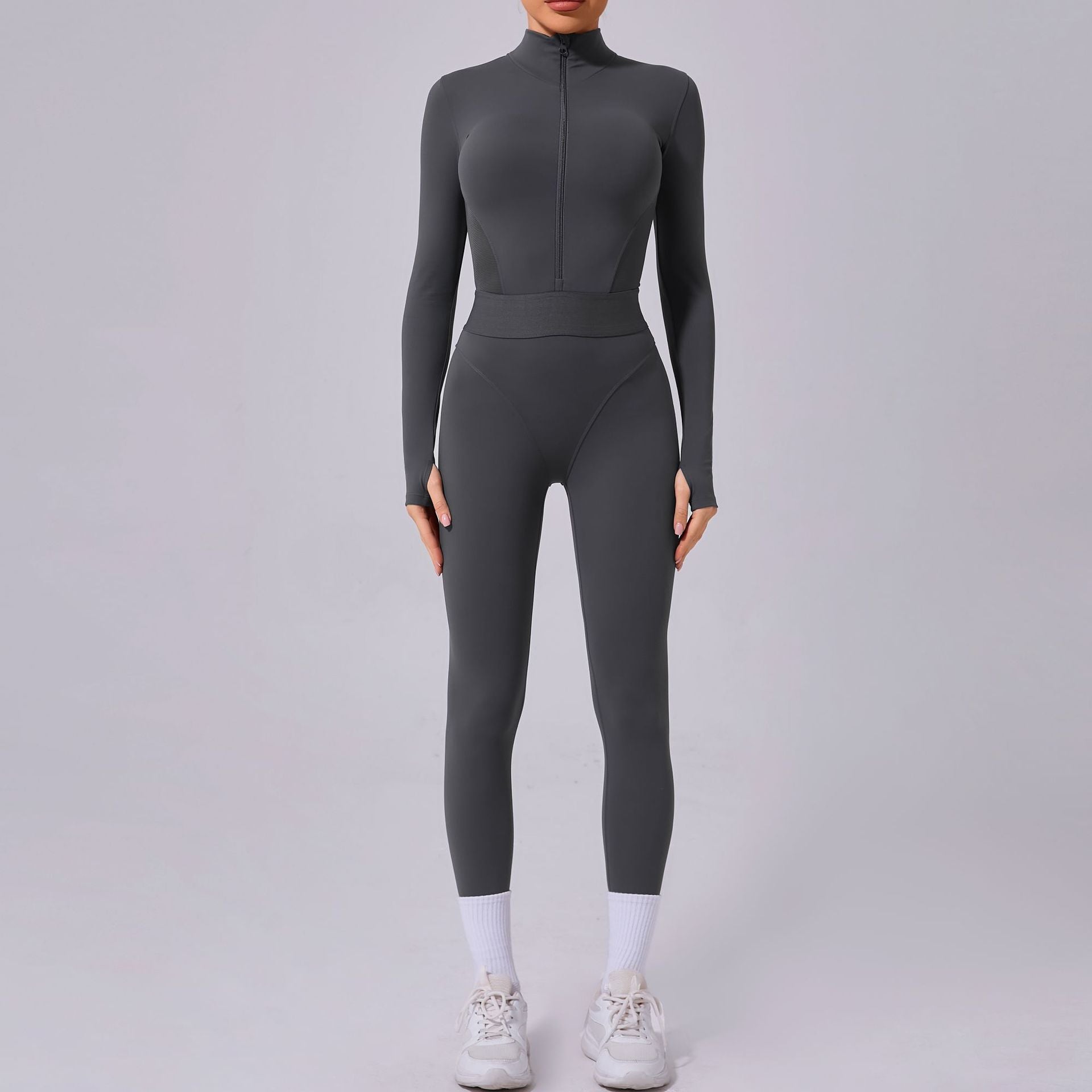 Mesh-Nähte an beiden Seiten Yoga-Jumpsuit Eng anliegender elastischer Bund Fingerloch-Naht Sport-Fitness-Einteiler
