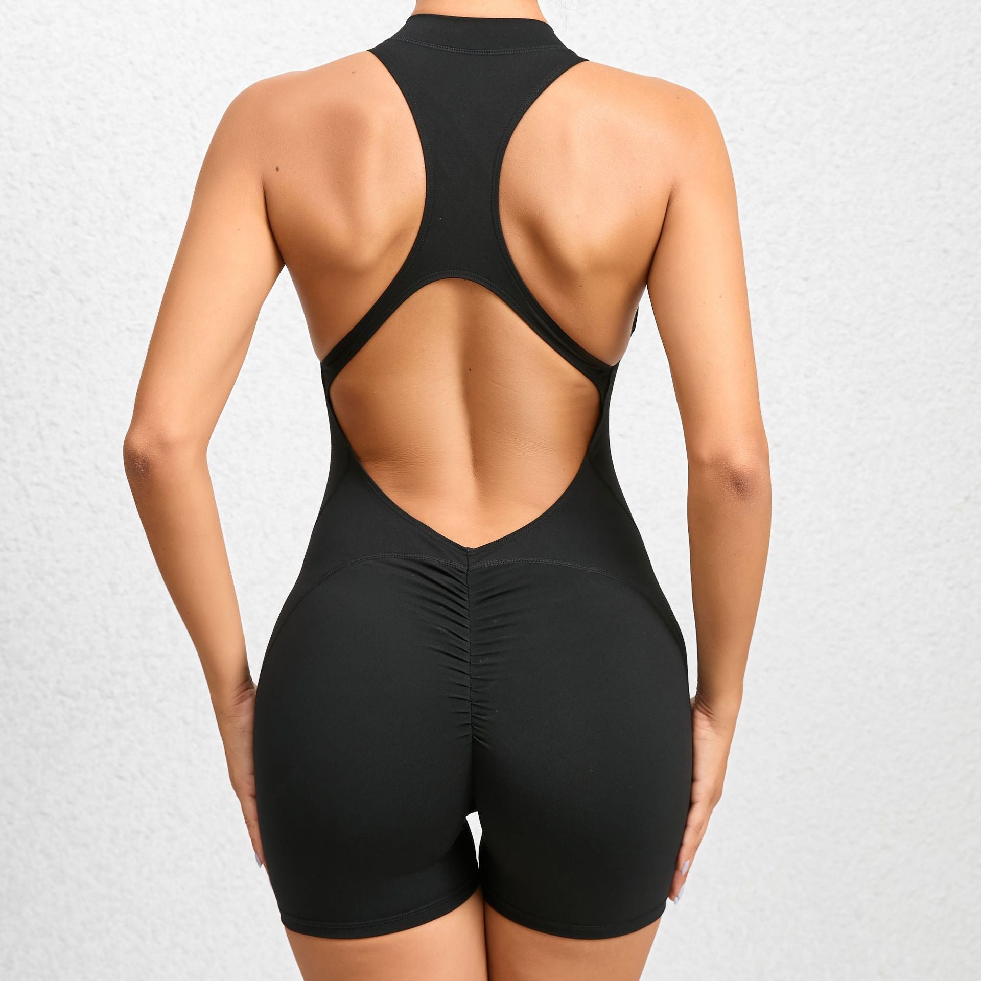 Non-Woven Enge Sporthose mit Reißverschluss Yoga-Hose Pfirsichpo Einteiliger schnelltrocknender plissierter Fitness-Jumpsuit