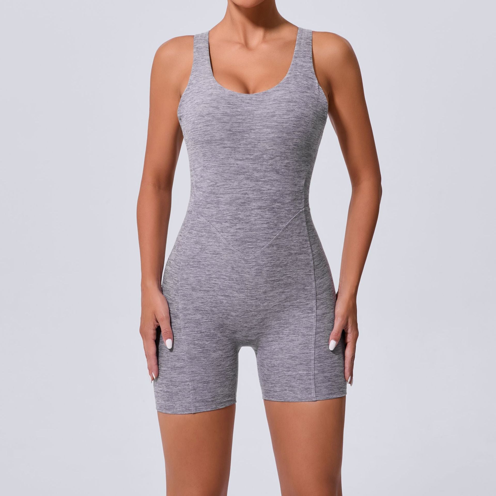 Herbst Sand Hollow Out Cutout Beauty Back Einteiliger Yoga Jumpsuit Skinny Schlankmachender Hüftstraffender Fitness Einteiler Sportbekleidung für Damen