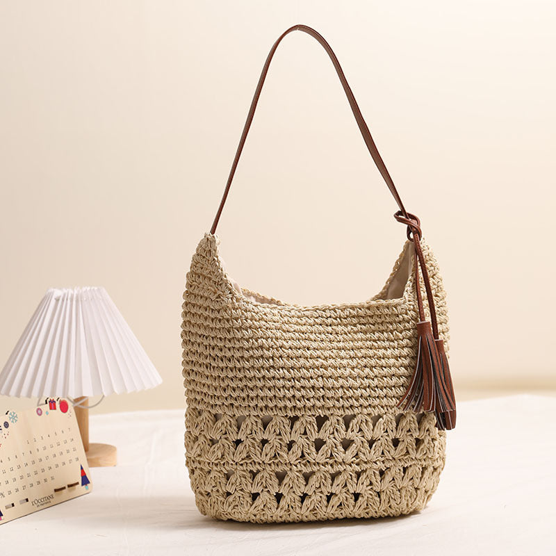 Ausgehöhlte ausgeschnittene Strohtasche Quasten-Strohtasche Gewebte Tasche Strandurlaub Strandtasche Lässige Umhängetasche