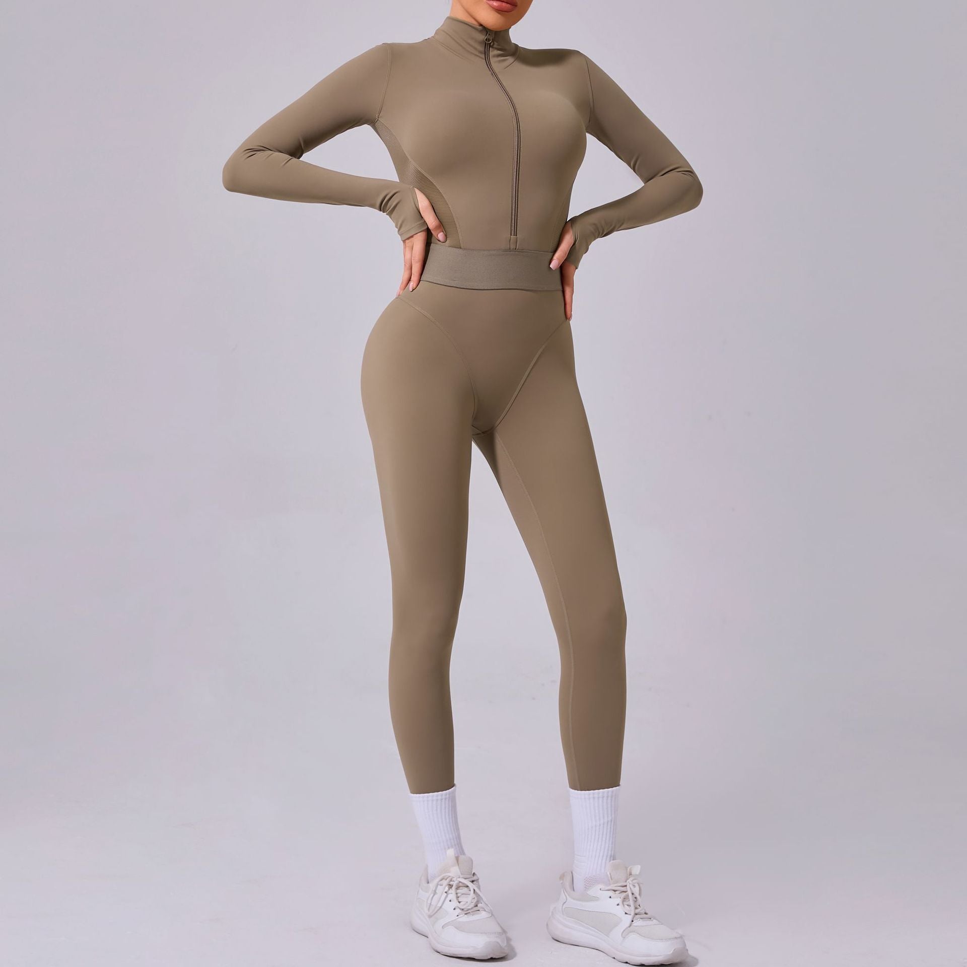 Mesh-Nähte an beiden Seiten Yoga-Jumpsuit Eng anliegender elastischer Bund Fingerloch-Naht Sport-Fitness-Einteiler