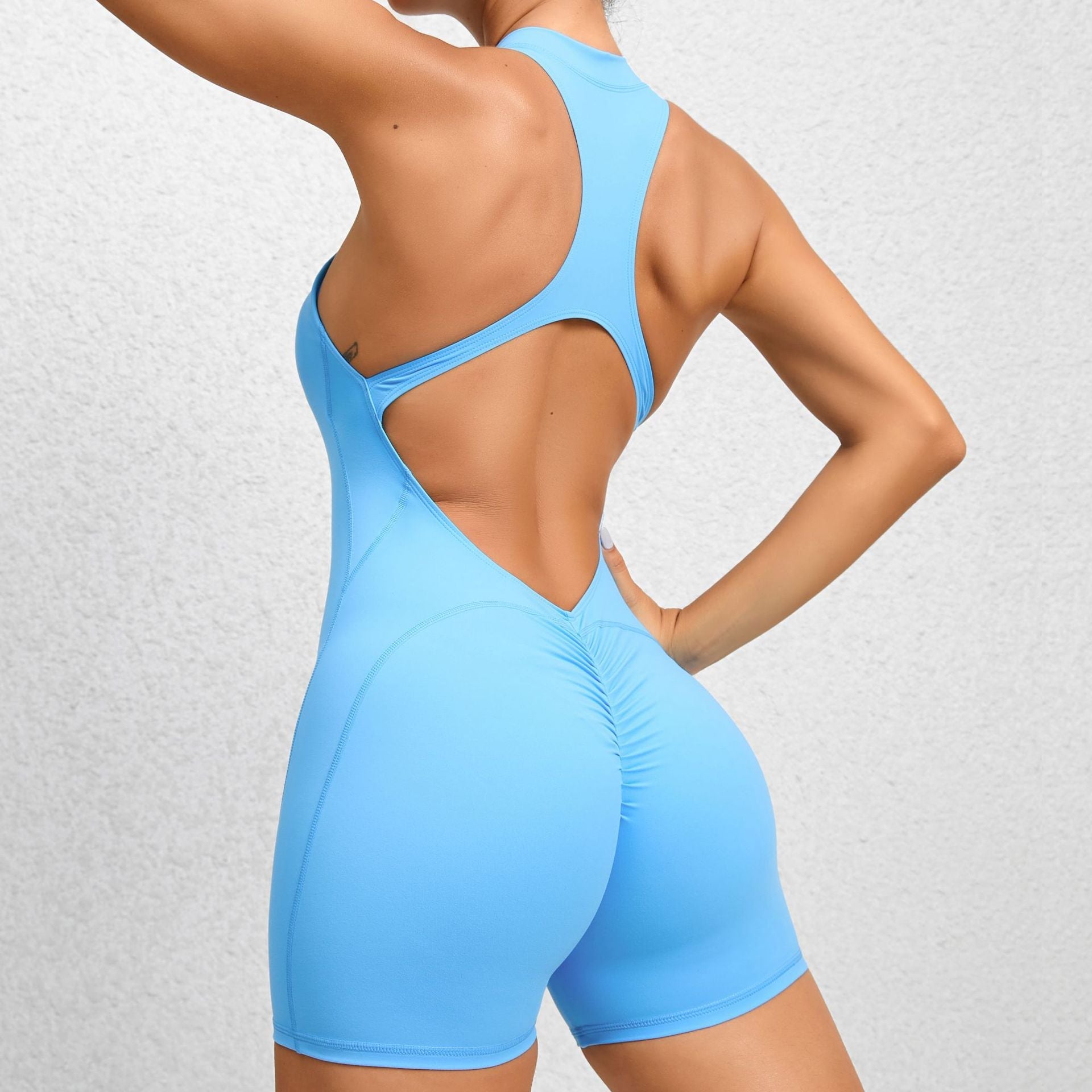 Non-Woven Enge Sporthose mit Reißverschluss Yoga-Hose Pfirsichpo Einteiliger schnelltrocknender plissierter Fitness-Jumpsuit