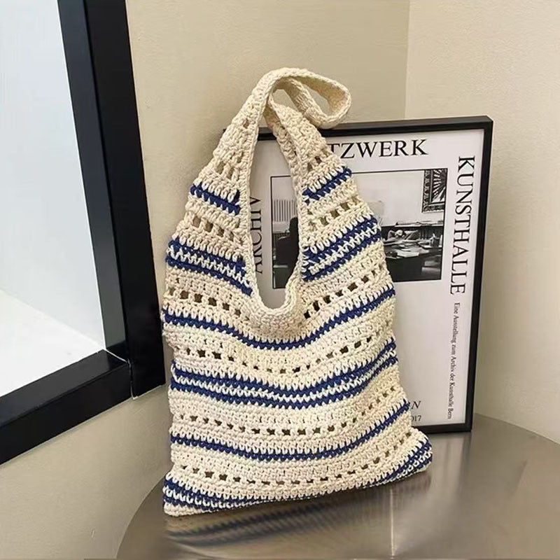 Gestreifte Ein-Schulter-Baumwollfaden-Webtasche Große Kapazität Hohlgeschnittene Strohtasche Strandurlaub Strandtasche