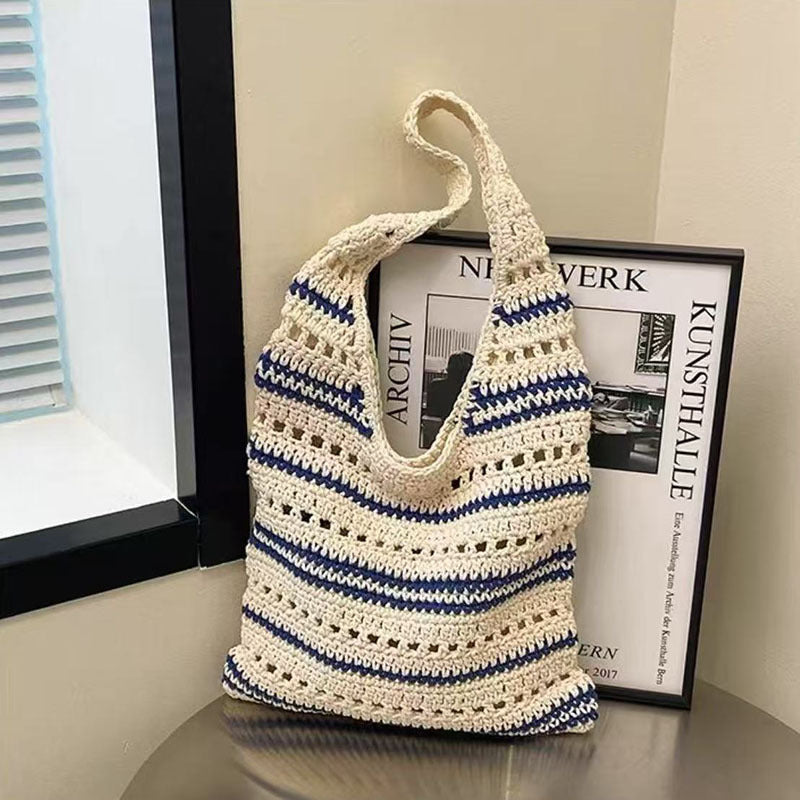 Gestreifte Ein-Schulter-Baumwollfaden-Webtasche Große Kapazität Hohlgeschnittene Strohtasche Strandurlaub Strandtasche