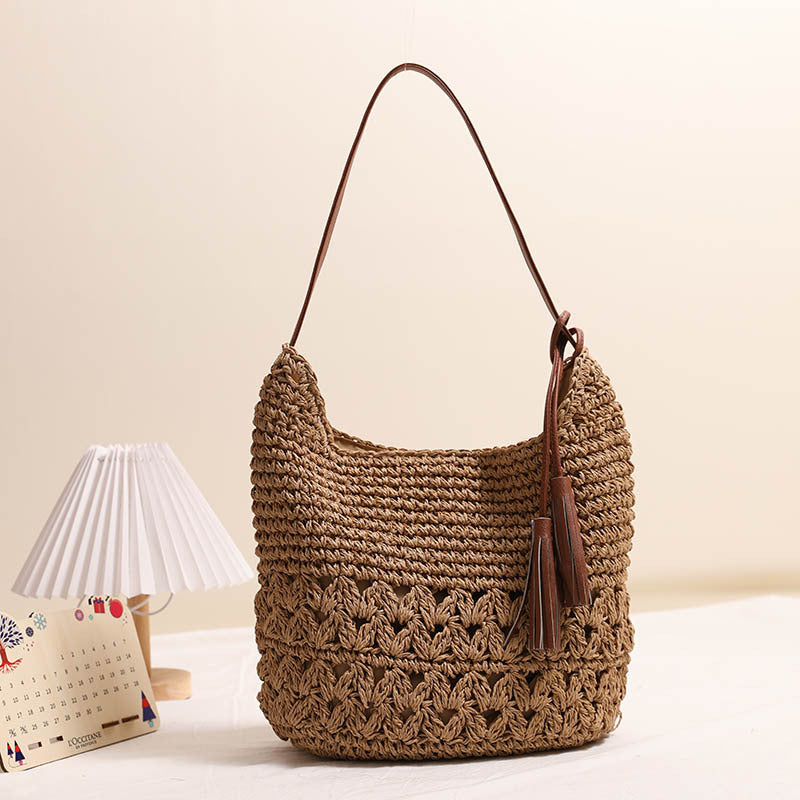 Ausgehöhlte ausgeschnittene Strohtasche Quasten-Strohtasche Gewebte Tasche Strandurlaub Strandtasche Lässige Umhängetasche