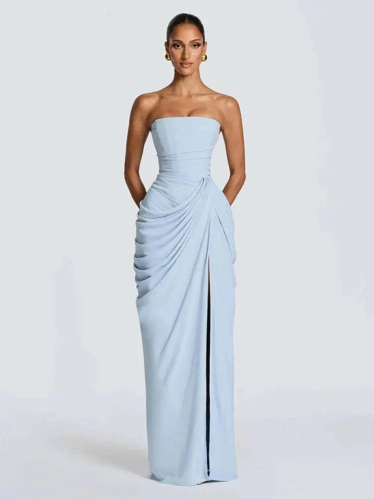 Elegant solid strapless pleated maxi dress for women, sleeveless with waist cinching and split, ideal for evening parties.