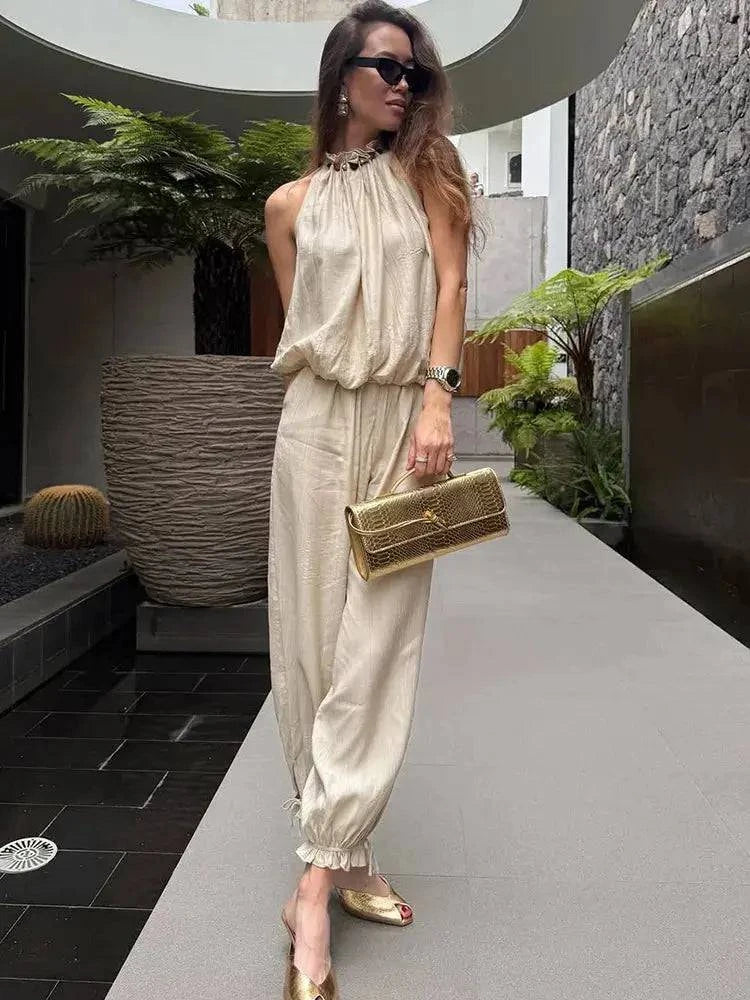 Beaded halter neck bubble top with high waist wide-leg linen blend pants set for summer casual or resort wear.