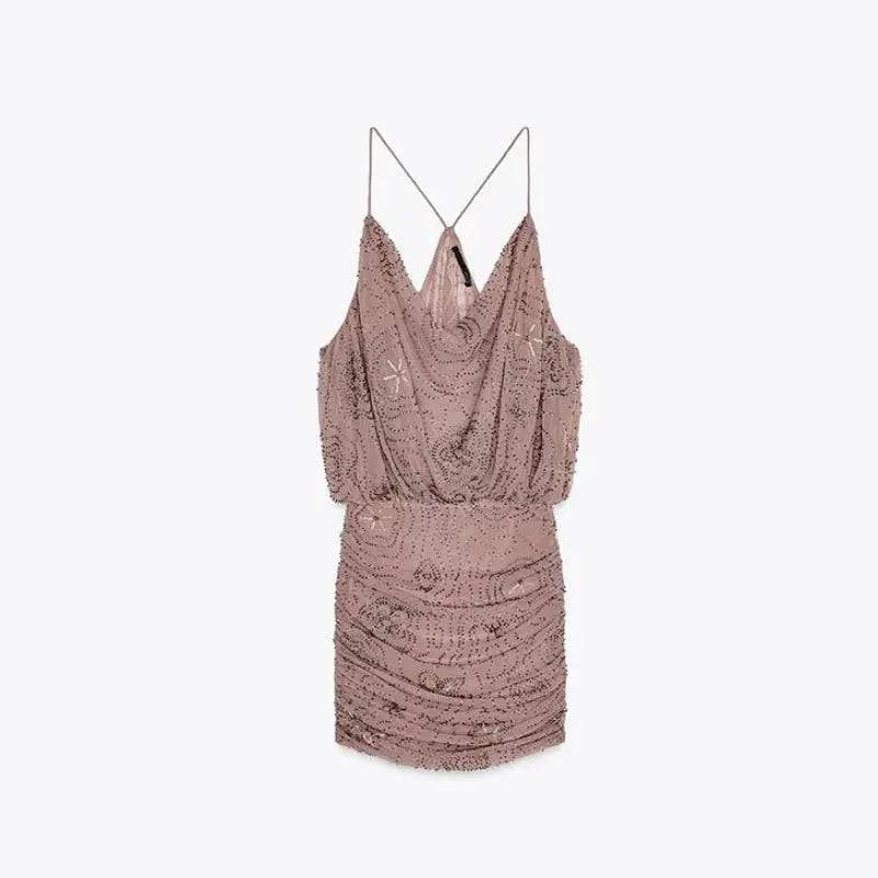 Sleeveless backless women's dress with bead embroidery, sequins, and ruffle detail, perfect for summer parties and evening events.