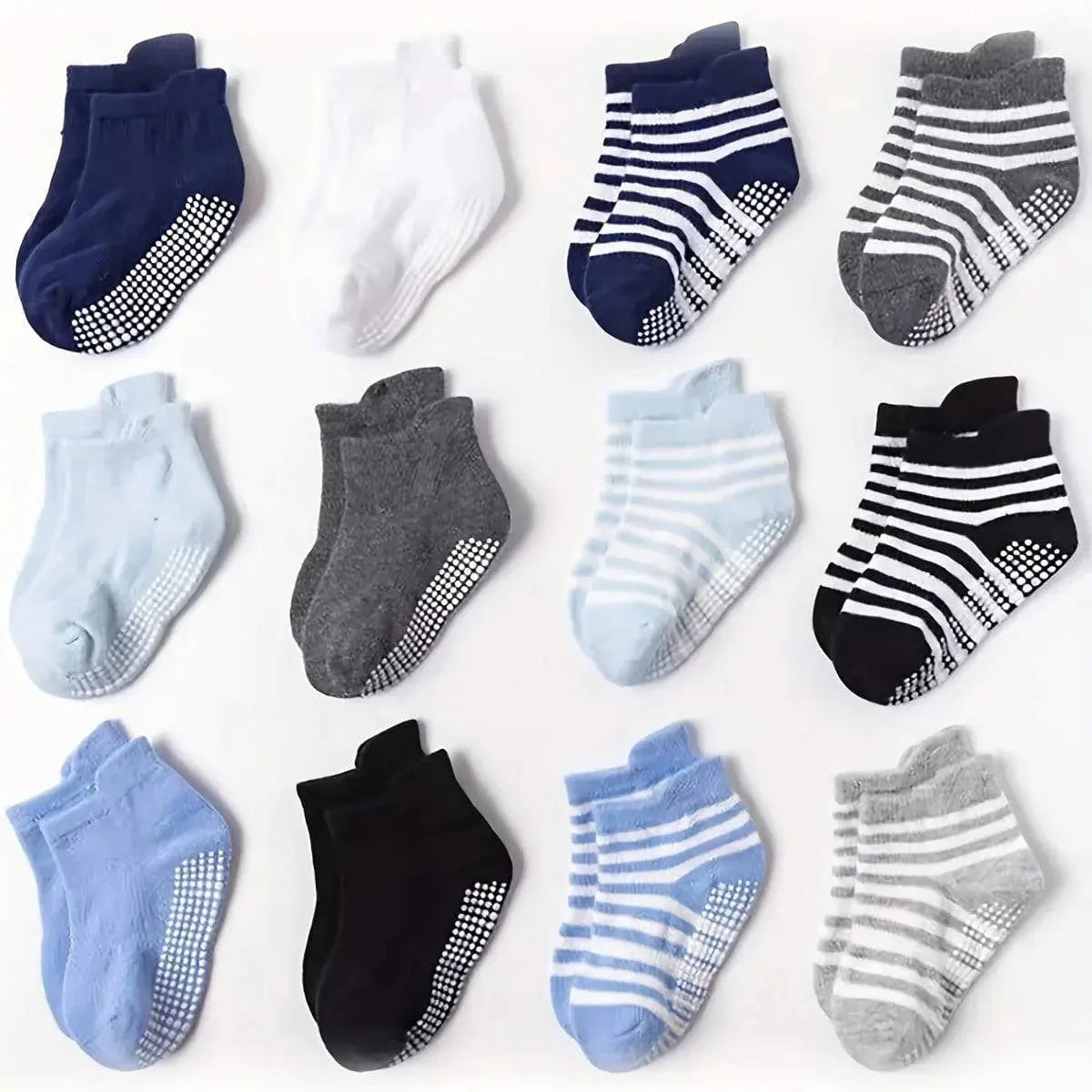 Six pairs of SHOPEZRA L.L.C. kids' anti-slip socks featuring cute cartoon animal patterns, breathable and comfortable for boys and girls.