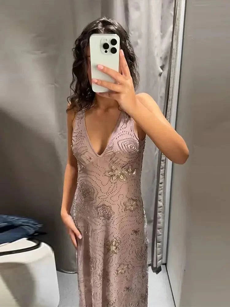 Sleeveless backless women’s evening dress with bead embroidery, sequins, ruffle, and strap design, perfect for summer parties and holidays.