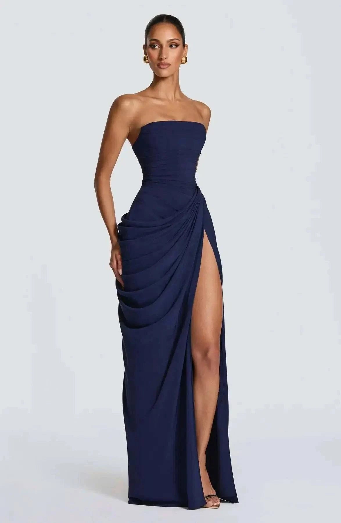 Elegant solid strapless pleated maxi dress for women, sleeveless with waist cinching, perfect for evening parties and special occasions.