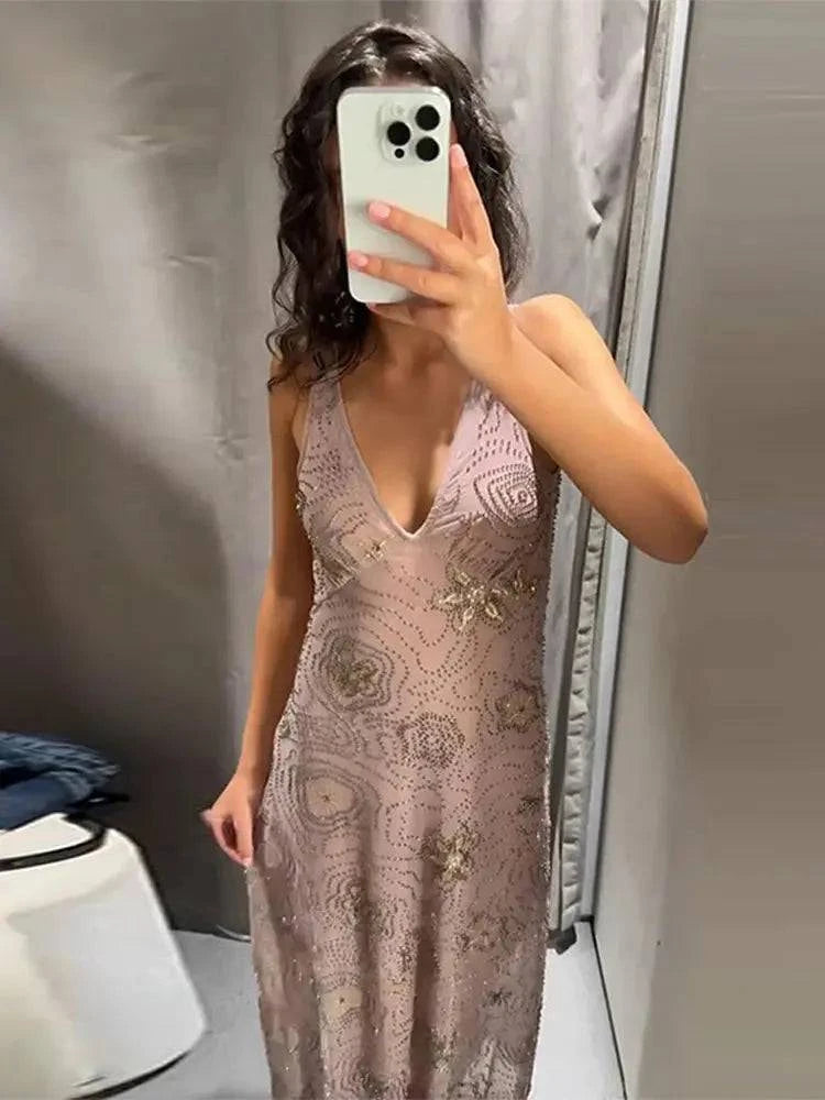 Sleeveless backless women’s evening dress with bead embroidery, sequins, and ruffle details, perfect for summer parties and holidays.