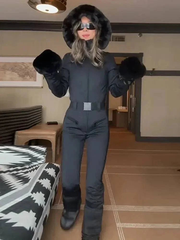 Women’s winter ski jumpsuit with fur collar, hood, high waist, and zipper, featuring solid color and slim fit for outdoor skiing.