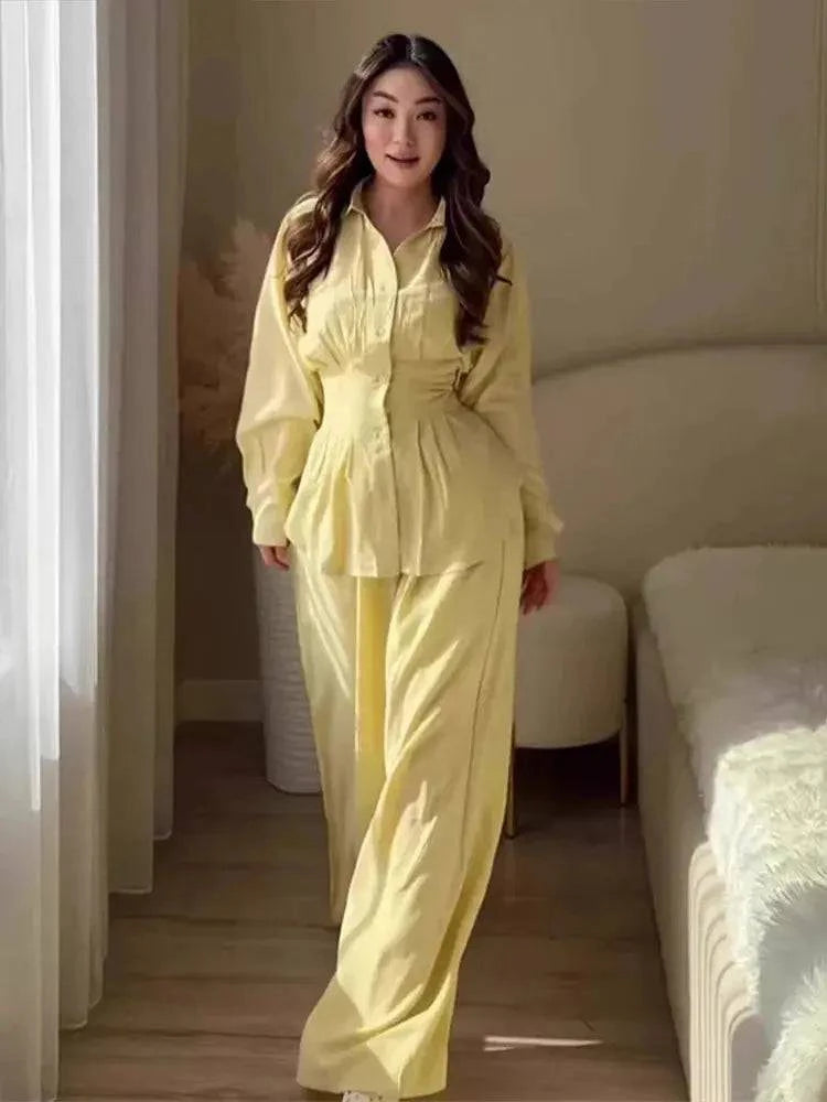 Beaded halter neck bubble top with high waist wide-leg linen blend pants set, perfect for summer casual or resort wear.