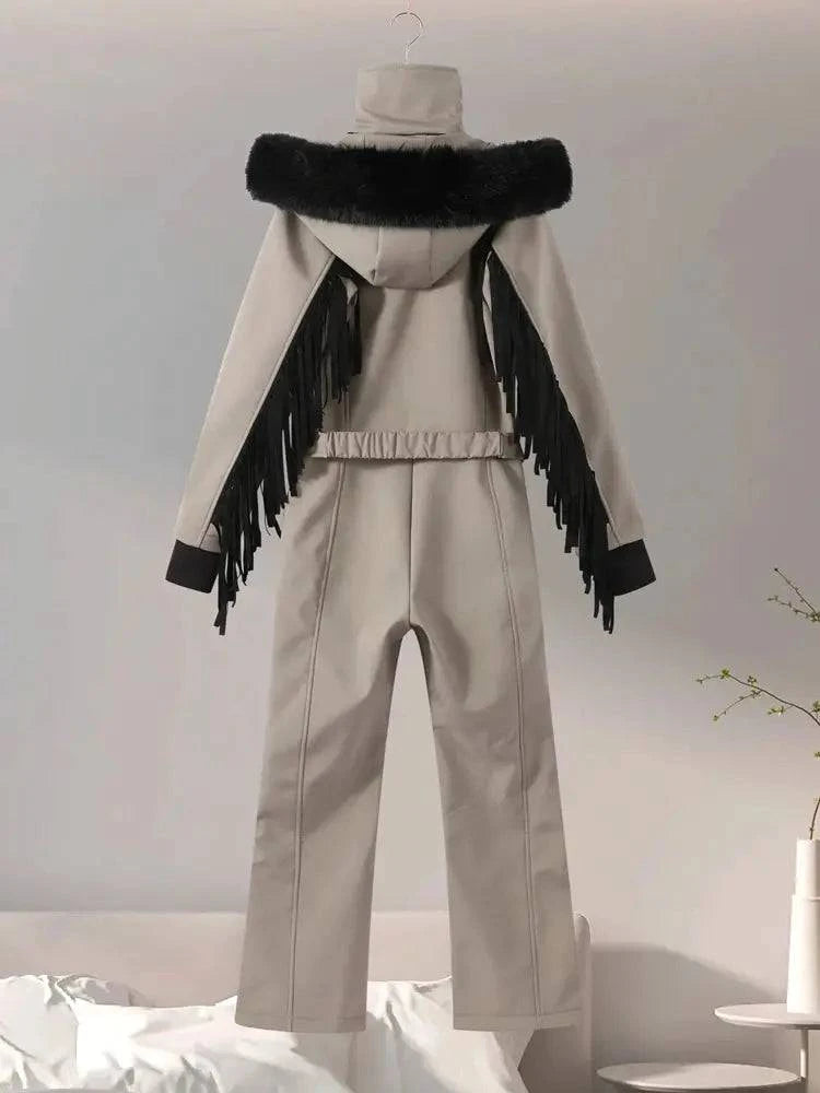 Women’s winter ski jumpsuit with fur collar, hood, high waist, solid color, thick material, and zipper closure, outdoor overalls.