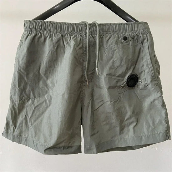 Hochwertige Luxus-Kniebund-Sommer-Freizeit-Sport-Nylon-Shorts für Herren, locker, Strand, 5-Punkt-Hose