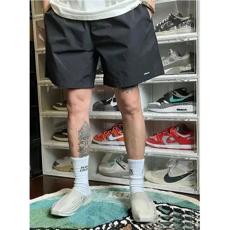 JJJJOUND joint nylon solid color classic quick-drying shorts drawstring loose sports beach pants men and women couple trend SHOPEZRA L.L.C.