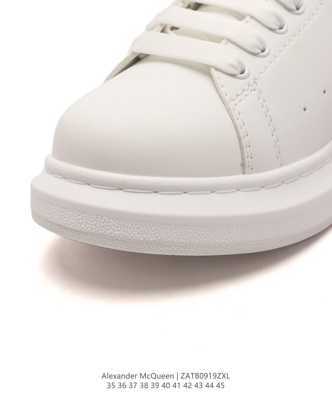 Alexander McQueen Sneakers White &amp; Red | Luxury Fashion Statement