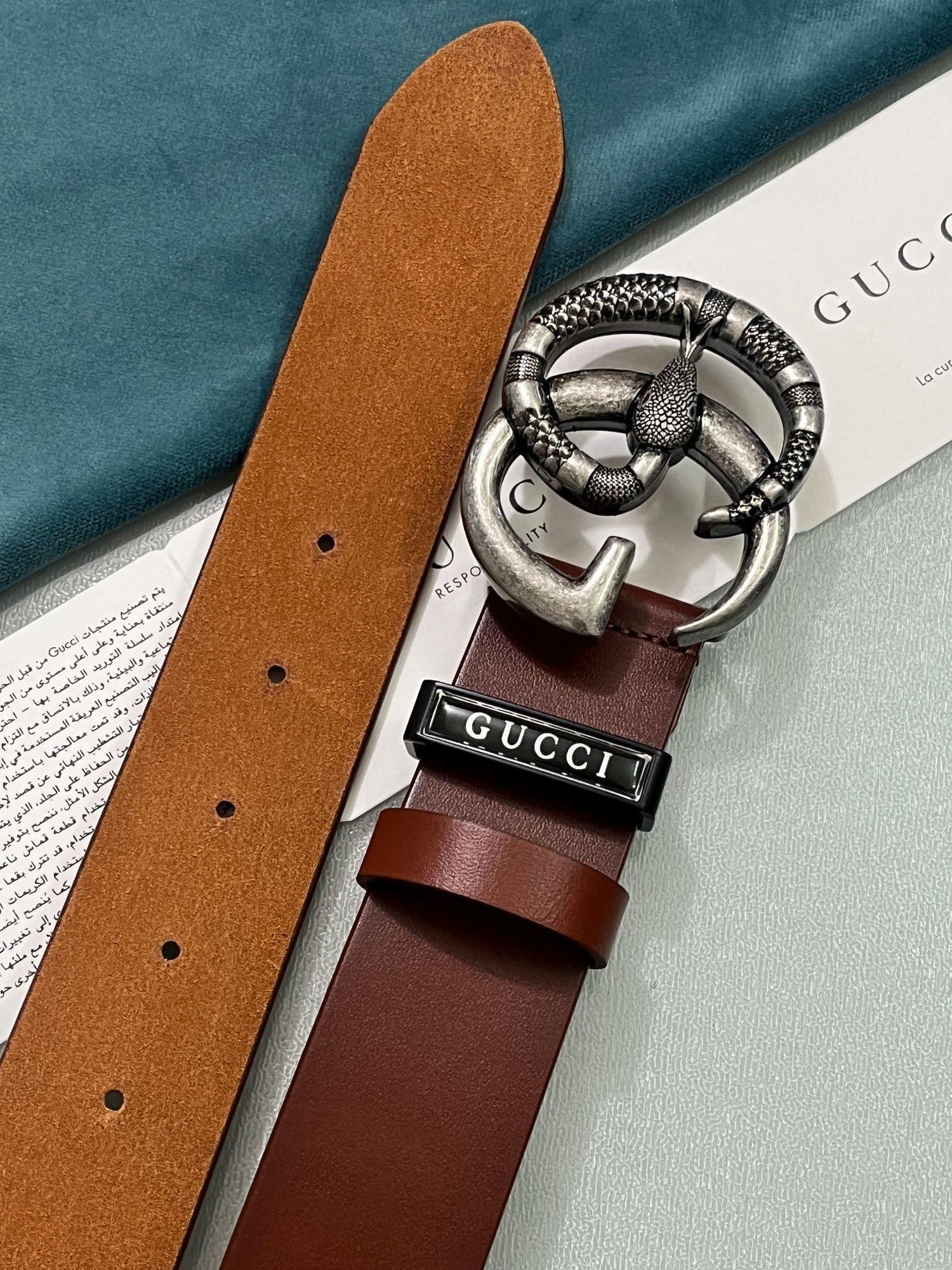 GUCCI Embellished coated-canvas and leather belt &