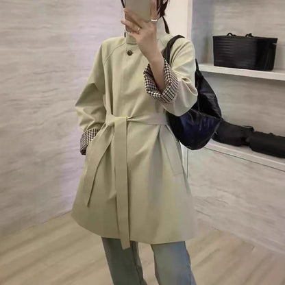 Cinched-waist mid-length trench coat