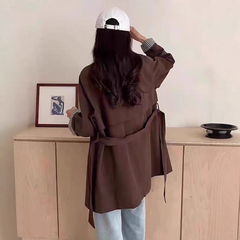Cinched-waist mid-length trench coat