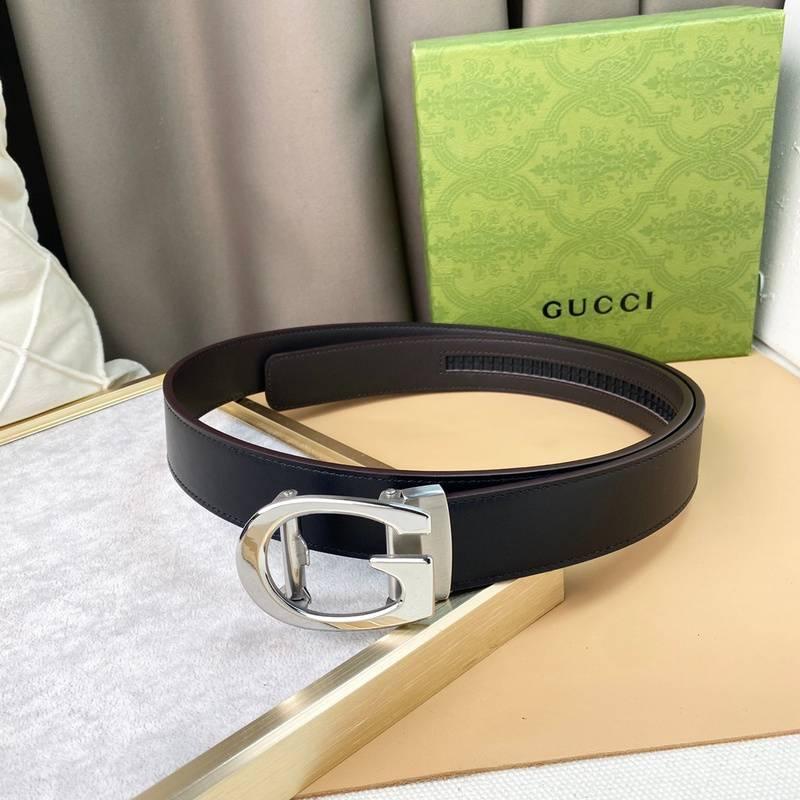 GUCCI Embellished coated-canvas and leather belt &