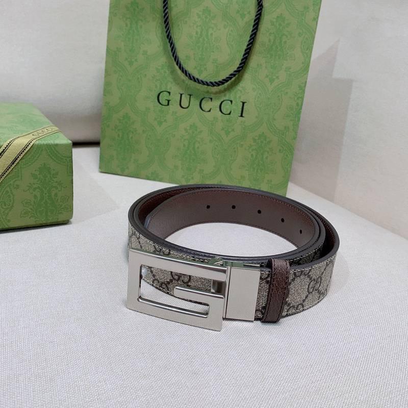 GUCCI Embellished coated-canvas and leather belt &