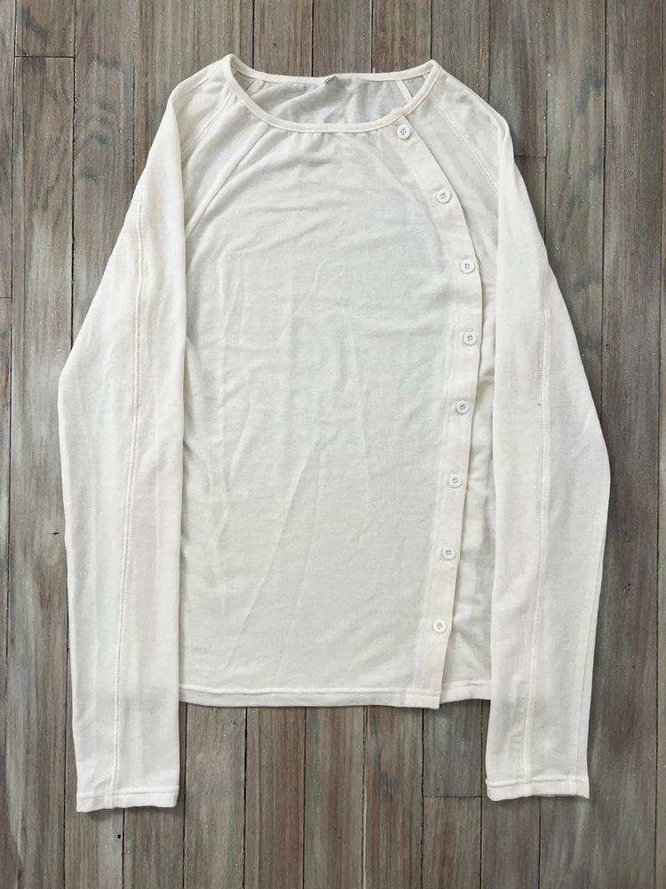 Black long-sleeved button T-shirt with crew neck by Dropshipman, made from soft fabric, displayed flat on a white background.