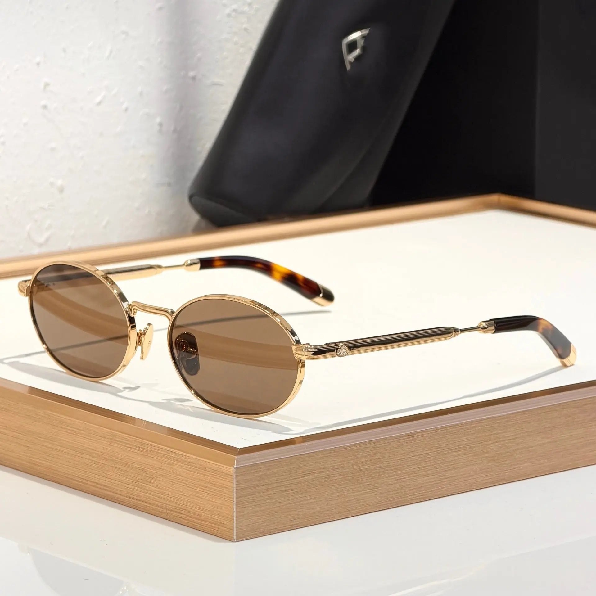 Metal oval-frame sunglasses by Dropshipman with casual, versatile design and tinted lenses, ideal for everyday wear.