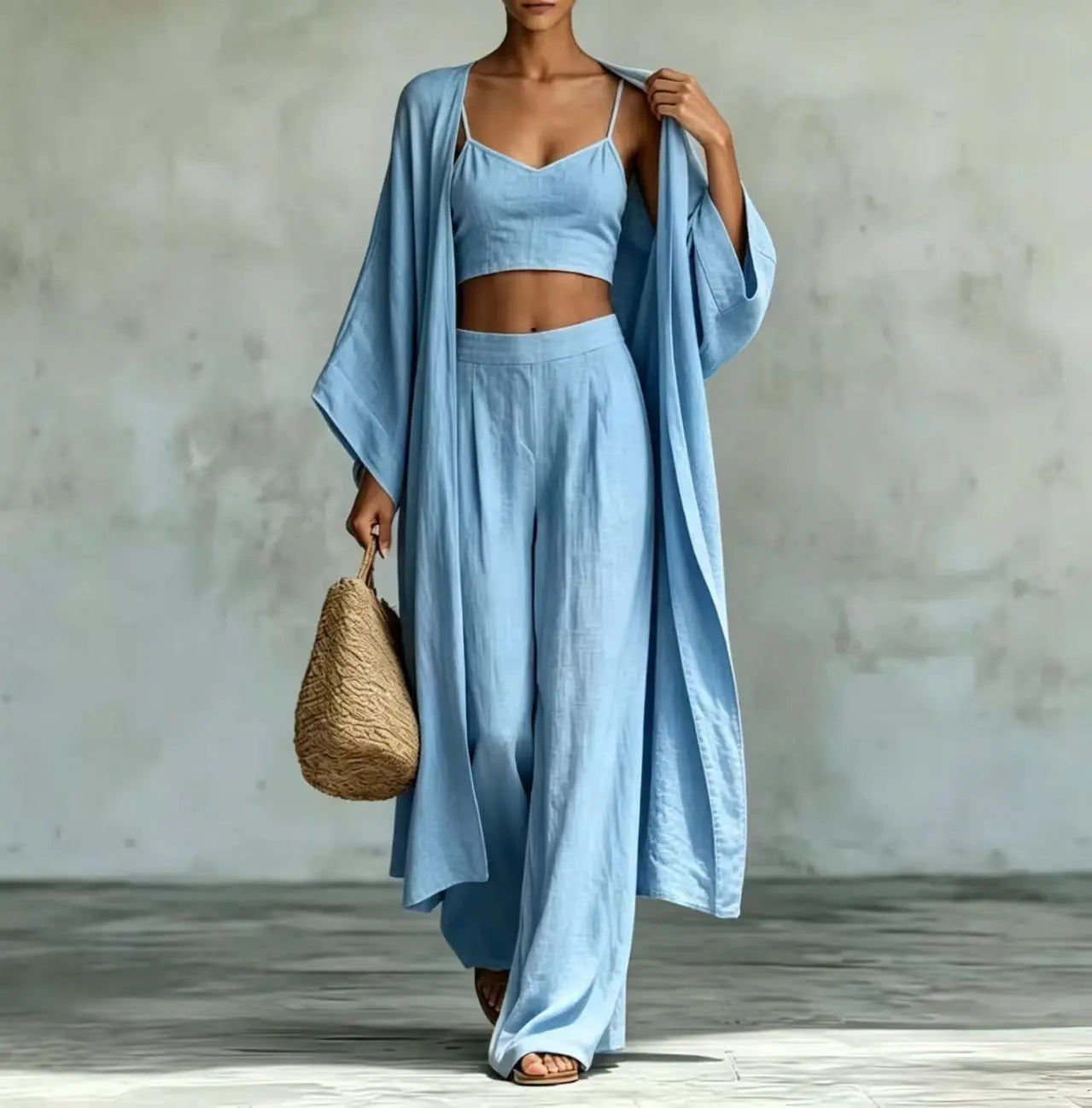 Dropshipman apricot three-piece set with cardigan, camisole, and high-waisted wide-leg pants displayed on a model.