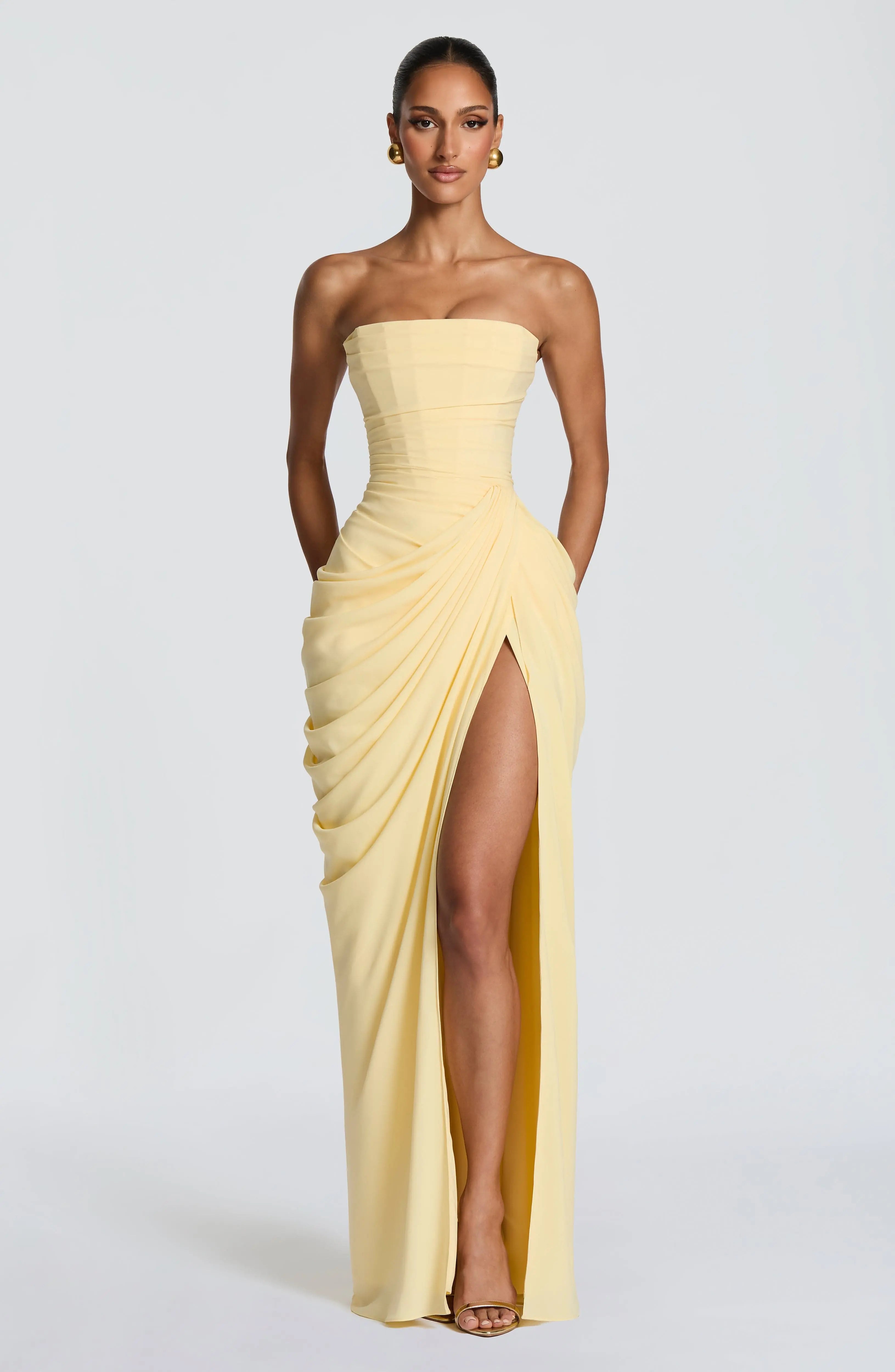 Yellow Cyra Maxi Dress by Dropshipman featuring a flowy silhouette and vibrant lemon print, perfect for summer wear.
