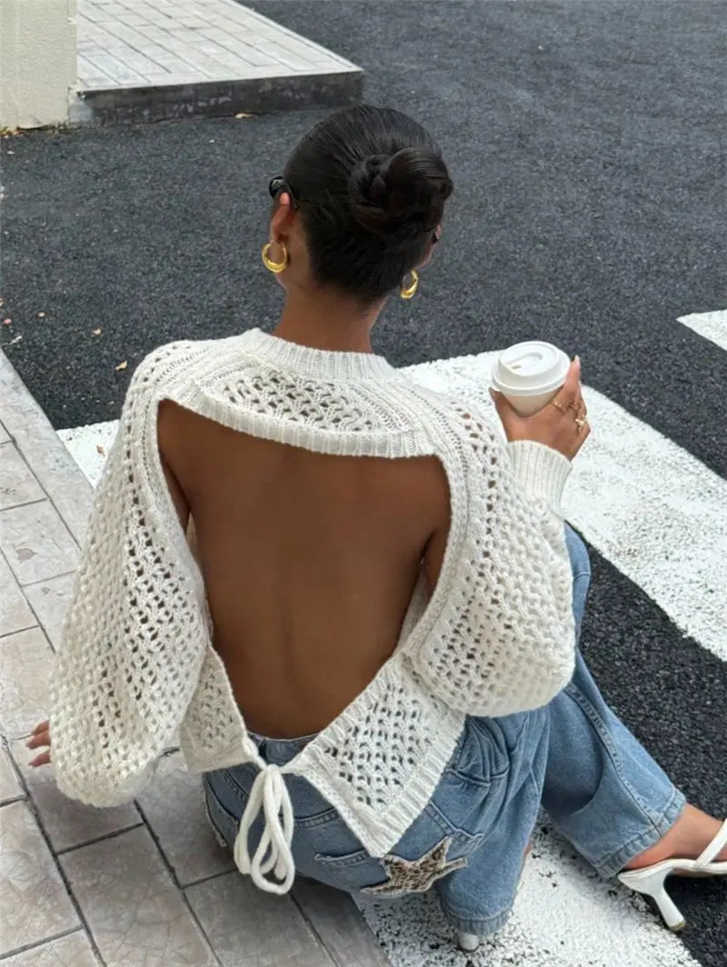 Beige apricot backless hollow-out knitted pullover sweater by Dropshipman, showing its stylish open-back design and cozy knit texture.