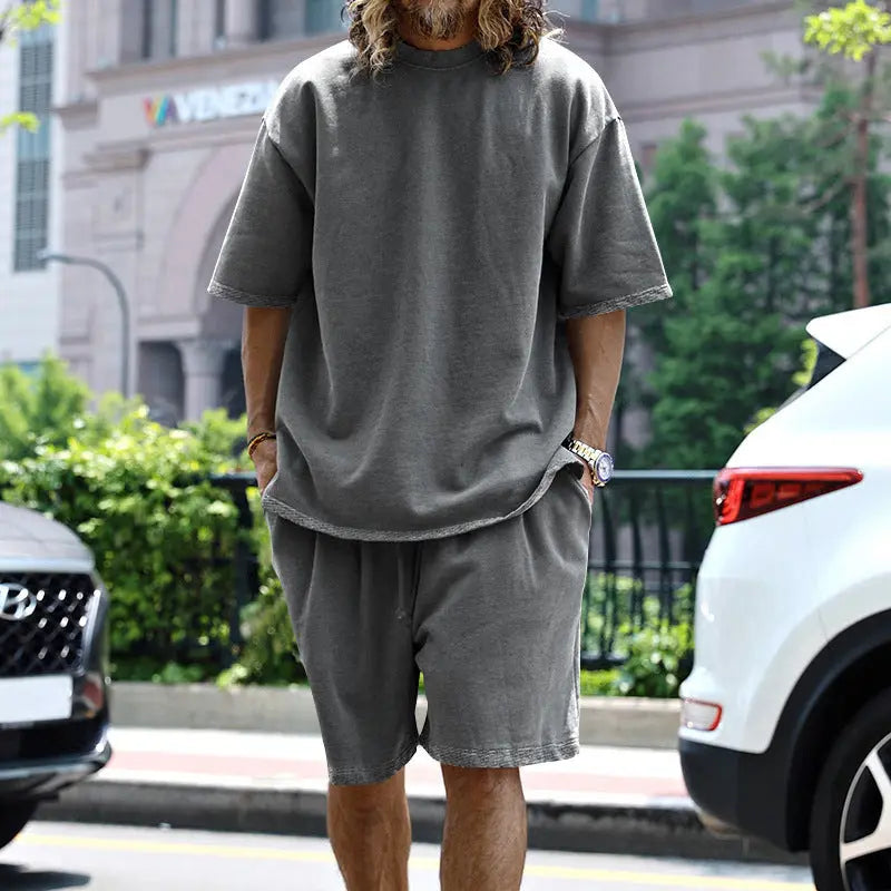 Dropshipman men's black 2-piece loose sports suit with round neck T-shirt and drawstring pocket shorts, casual summer active wear.