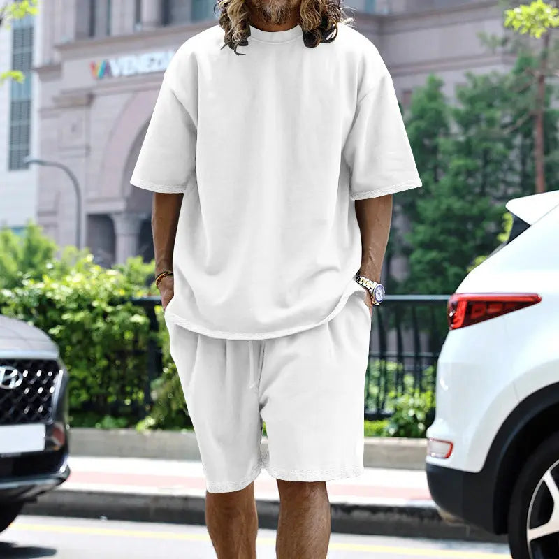 Dropshipman men's 2-piece loose sports suit with black short-sleeved T-shirt and drawstring pocket shorts, casual summer outfit.